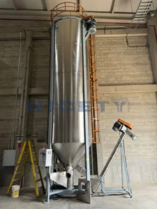 10-ton large-capacity vertical silo batch mixer delivered to a post-consumer plastics recycling plant in Chile for regrind flake homogenization.