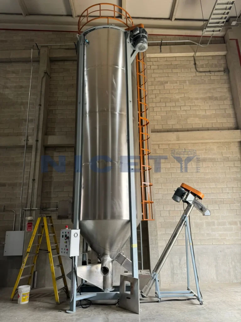 10-ton large-capacity vertical silo batch mixer delivered to a post-consumer plastics recycling plant in Chile for regrind flake homogenization.